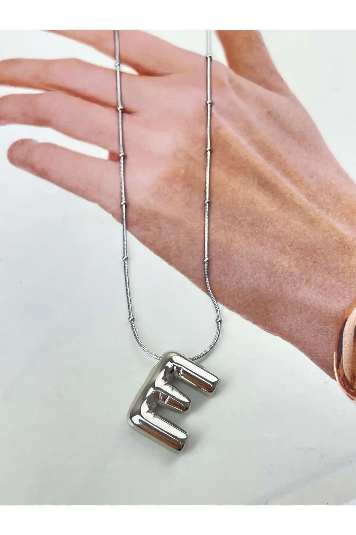 ZERDE Gümüş Renk Balon Bubble Model Çelik Harf Kolye İnceleme ve Özellikleri