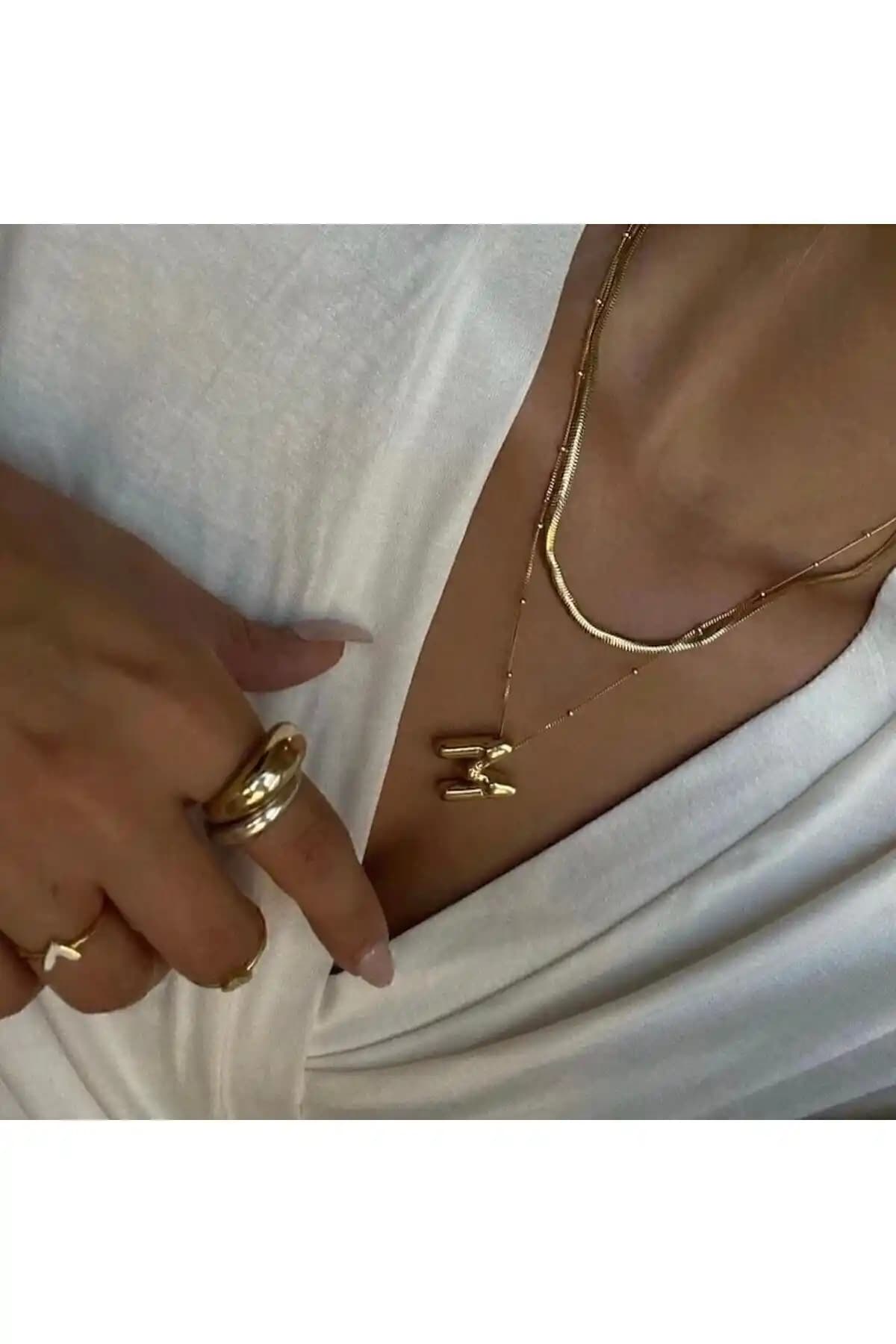 Balon M Harf Kolye: Şıklık ve Dayanıklılığı Bir Arada Sunan Modern Aksesuar