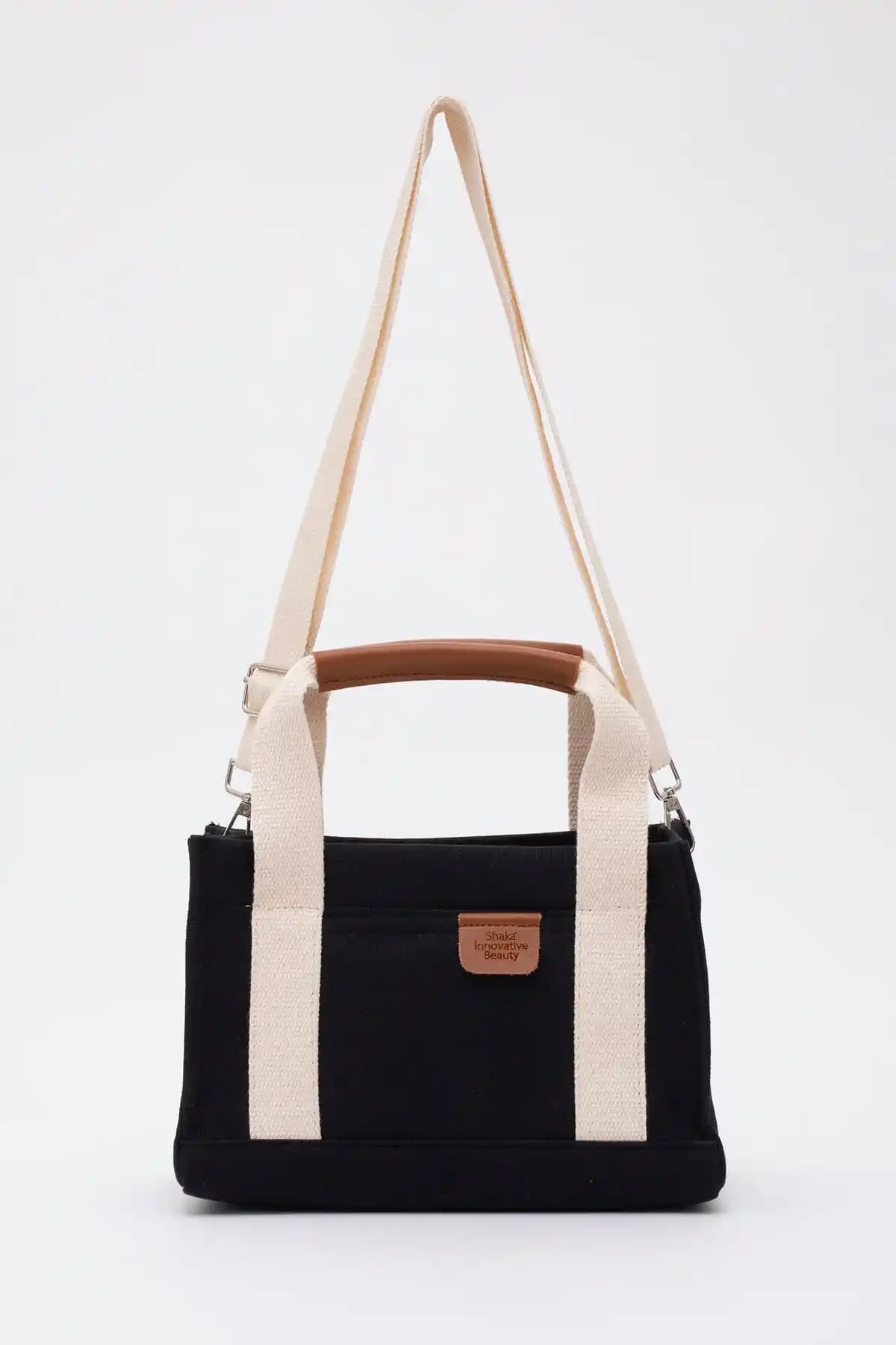 Shaka Siyah 2 Bölmeli Kumaş Askılı Fermuarlı Günlük Çanta Özellikleri ve Kullanım Rehberi